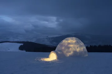 Fotobehang Snow igloo in the mountains © Oleksandr Kotenko