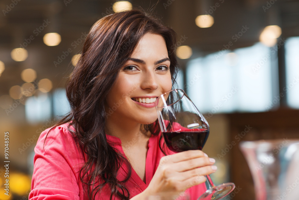 Sticker smiling woman drinking red wine at restaurant