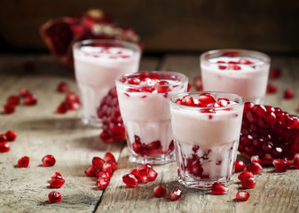 Homemade yogurt with pomegranate pink, selective focus