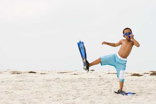 Boy Wearing Snorkel And Flippers