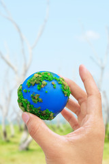 Hands and Earth. Concept Save green planet.