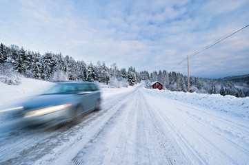 Fototapeta na wymiar Driving in the snow