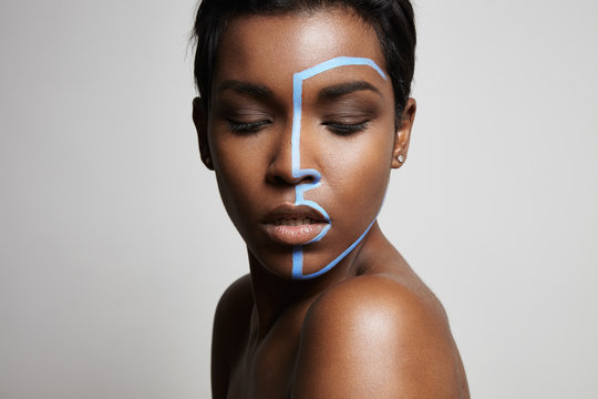black woman with a line on her face