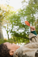 Boy holding a leaf