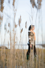 Mature woman walking on marshland