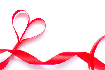 Red ribbon with heart shape