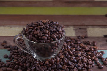 Clear cup with coffee beans