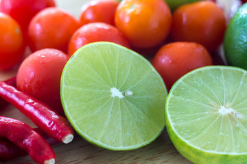 Fototapeta na wymiar Lime chili and tomato close-up