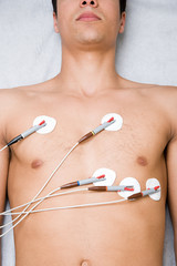 Man with electrodes on chest