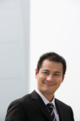 Smiling Chinese businessman