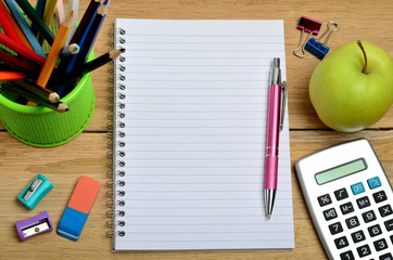 Notebook with office supply
