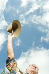 Senior man celebrating