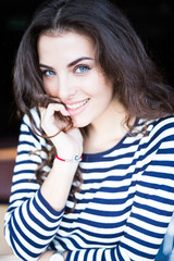 Close up portrait of beautiful smiling young woman