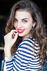 Close up portrait of beautiful smiling young woman