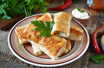 Grilled pita bread with cheese filling 