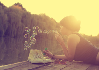 Vintage photo of bubble blower woman