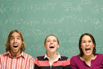Three students laughing