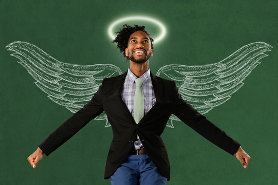 Businessman With Wings and Halo