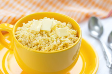 Millet porridge with butter and milk