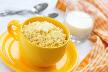 Millet porridge with butter and milk