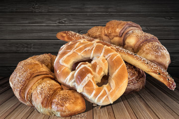 Pretzels with Bunch of Croissant Sesame Puff Pastry on Bamboo Place Mat Background.