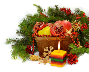 Christmas composition with a lighted candle.