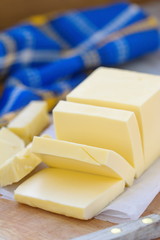 Fresh butter on the wooden table
