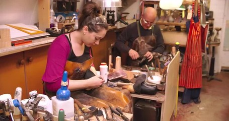 Workers In Bespoke Shoemaker Glueing Together Leather