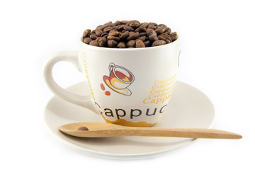 Cup full of coffee beans isolated