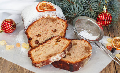 Fruitcake with nuts, raisins, candied fruit and spices. Fruitcake with nuts, raisins, candied fruit and spices. Traditional Spicy Christmas cake

