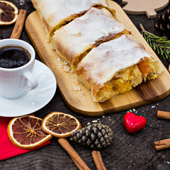 .Strudel with custard and orange. Christmas Stollen. Christmas table decoration.