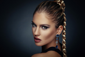 Woman beauty portrait with nice make up and braid hairstyle