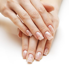 Beautiful female hands with french manicure isolated
