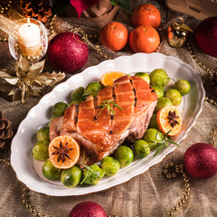 Christmas dinner with brussels sprouts in orange sauce