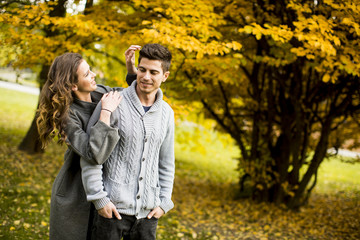Young couple in the autumn park