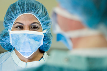 Surgeons in operating theatre