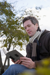 One man reading a book