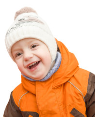 Portrait of the laughing kid in a cap and a jacket, isolated on
