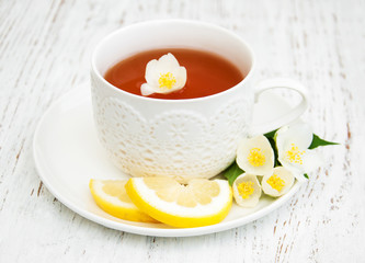 Cup of tea with jasmine flowers