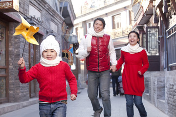 Family having fun in Hutong