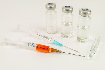 vaccine and two syringes