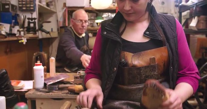 Bespoke Shoemaker Pinning Leather Together To Make Shoe
