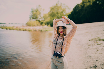 Smiling Retro Girl With Camera