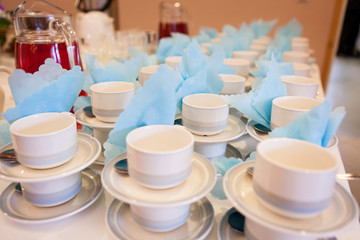 White coffee cups waiting for serving