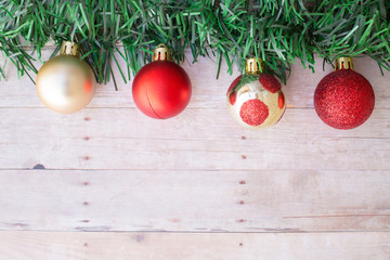 colorful ornaments on a wood background.
