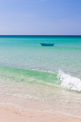 Fisher boat and clear turquoise water