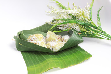 Thai dessert, Khao Tom Mad, steamed sticky rice with banana on banana leaf