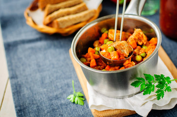 Pork Ragout with Carrots and Green Peas