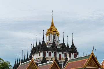 Naklejka premium Loha Prasat 'Metal Castle' in Wat Ratchanaddaram Worawihan at the intersection between Ratchadamnoen Klang and Maha Chai Road, Bangkok Thailand.