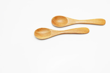 wooden spoon on white background